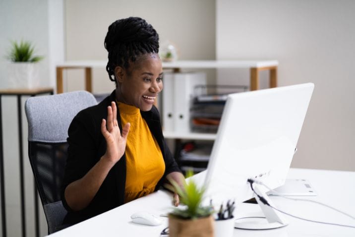 dithutong instructor teaching online courses 1 | Dithutong: Online Courses & eLearning in Botswana | eLearning for Botswana Teach online in Botswana — instructor smiling and waving to virtual students on Dithutong e-learning platform.