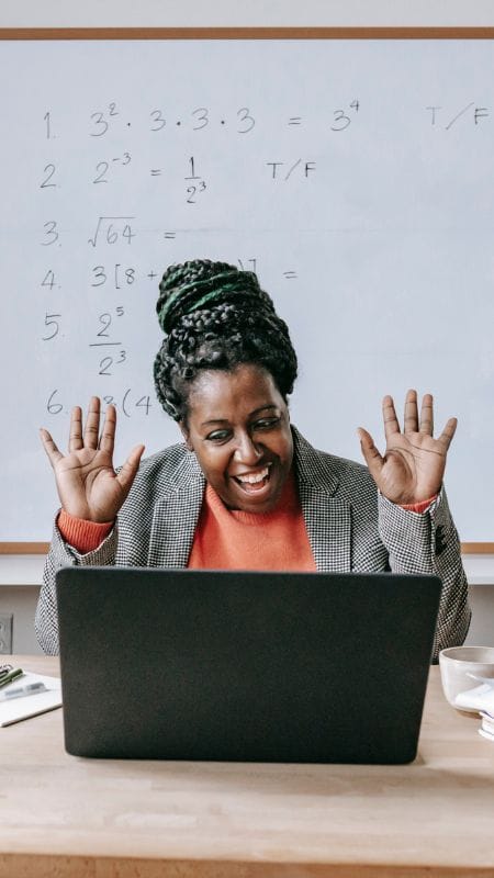botswana online teacher earn passive income | Dithutong: Online Courses & eLearning in Botswana | eLearning for Botswana Botswana instructor teaching an online course from home, waving to learners and earning passive income on Dithutong.