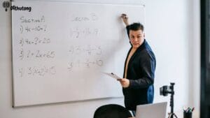 Local teacher creating an online course on a whiteboard | Dithutong: Online Courses & eLearning in Botswana | eLearning for Botswana Local teacher creating an online course on a whiteboard
