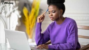 focused online student botswana e learning study tips | Dithutong: Online Courses & eLearning in Botswana | eLearning for Botswana Young woman in Botswana studying online on a laptop with notes