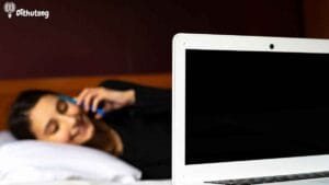 online learning self discipline distraction botswana | Dithutong: Online Courses & eLearning in Botswana | eLearning for Botswana Botswana learner distracted on phone while studying online, showing self-discipline challenge